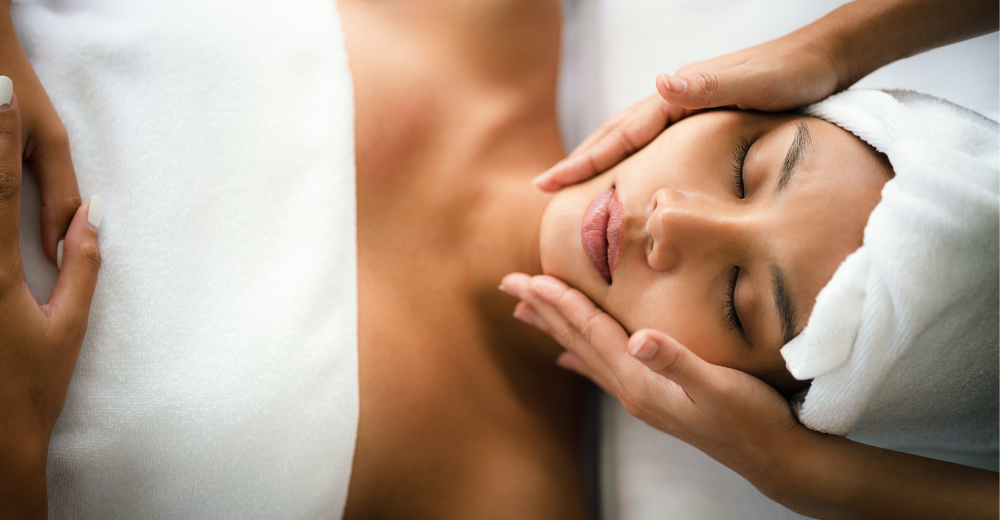woman relaxing massage facial